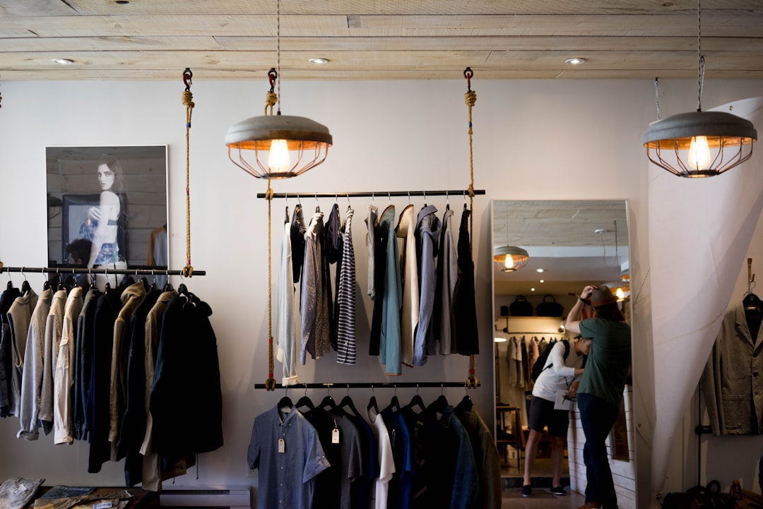 Minimal boutique interior with carefully selected clothing — retail visual reference