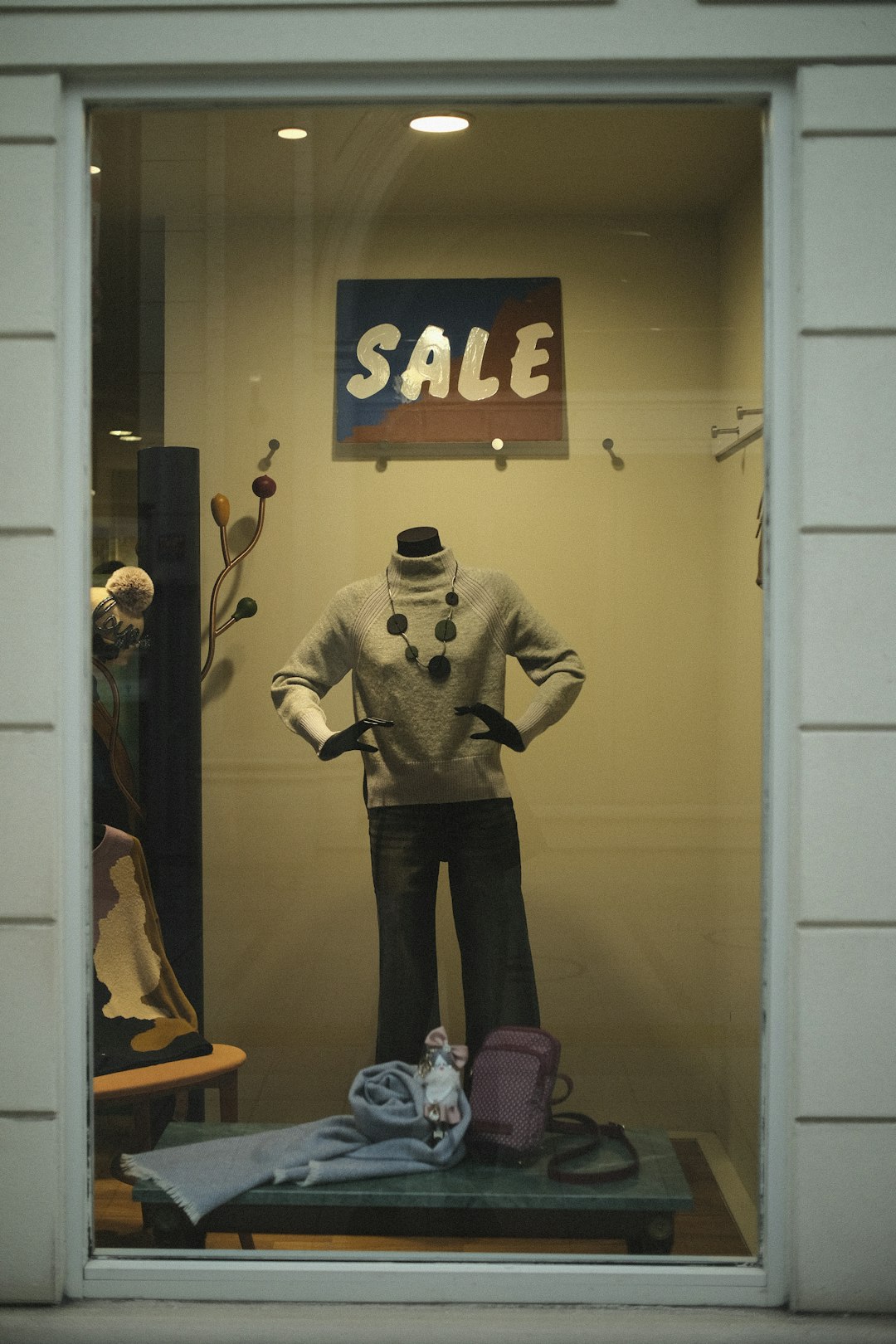 Boutique window display with considered retail presentation — visual reference